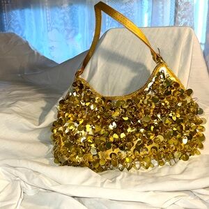 Gold handbag with beads and shingles